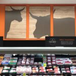 Retail Store Signage, and POP kits for Hannaford meat department from top premier sign company specializing in ADA guidelines.